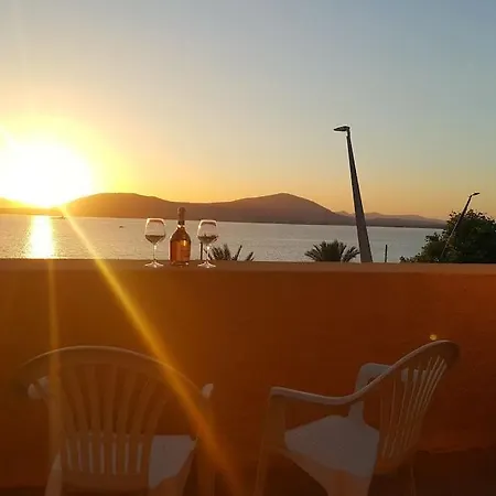 Seduti Di Fronte Al Mare Alguer